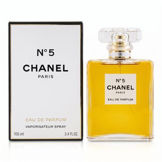 Chanel No. 5 Eau de Parfum bottle with its original white and black packaging box, displayed on a clean white background.